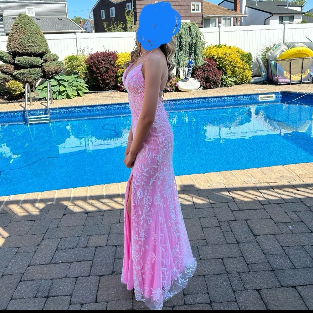 Gorgeous prom dress with beautiful detail. Worn once